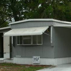 singlewide - aluminum siding - 1975 - roof over